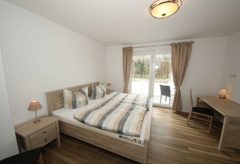 Schlafzimmer mit Doppelbett Schlafzimmer mit Doppelbett