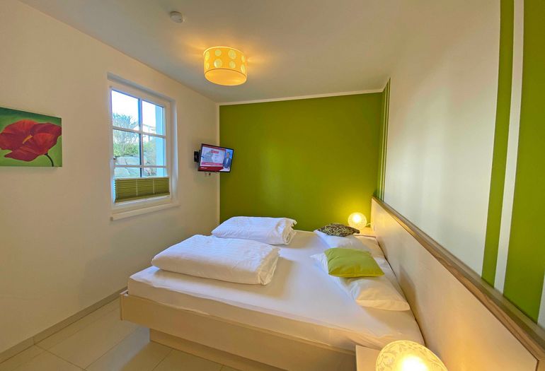 1. Schlafzimmer mit Doppelbett 1. Schlafzimmer mit Doppelbett