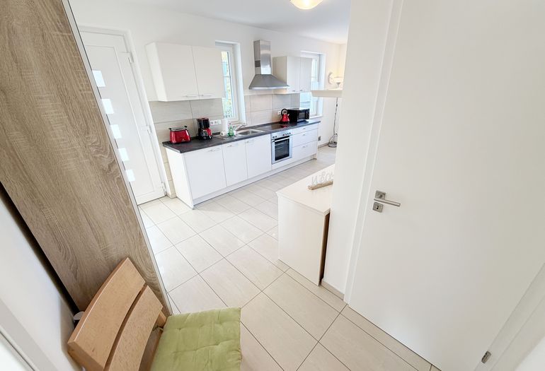 Haus Möwe Wohnung 01 - Blick vom Flur in das Wohnzimmer Haus Möwe Wohnung 01 - Blick vom Flur in das Wohnzimmer