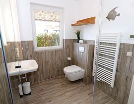 Ferienhaus Uns lütt Hus mit Sauna, Kamin & Terrasse