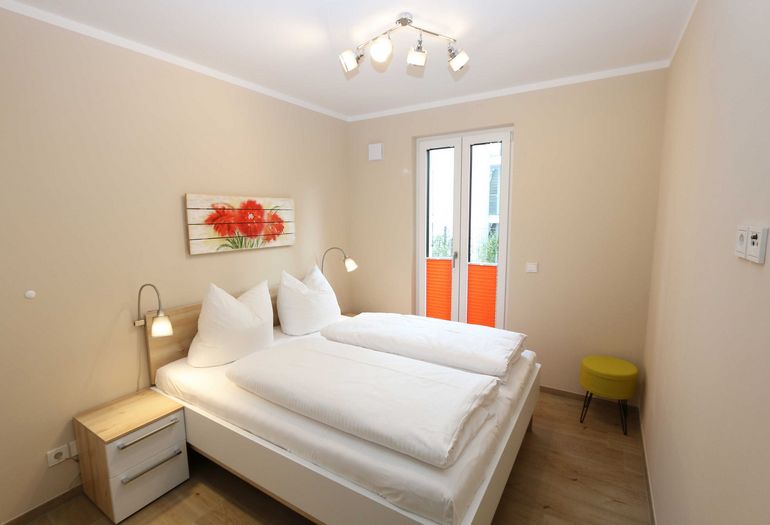 Schlafzimmer mit Doppelbett