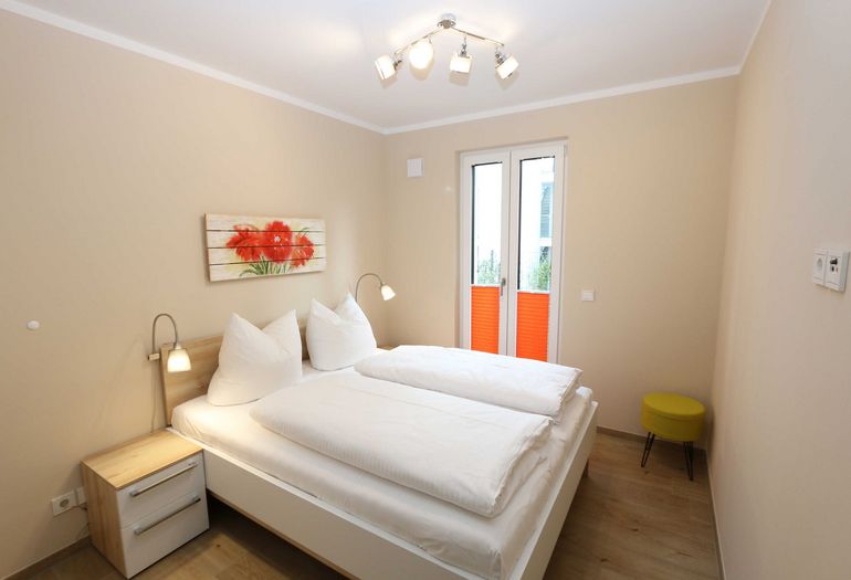 Schlafzimmer mit Doppelbett Schlafzimmer mit Doppelbett