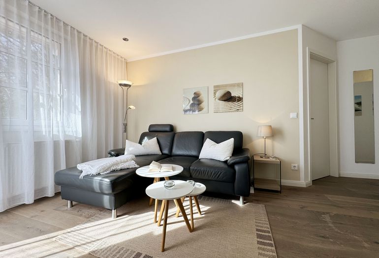 Haus Meeresblick A 4.03 Urlaubsglück -Wohnbereich mit Couch