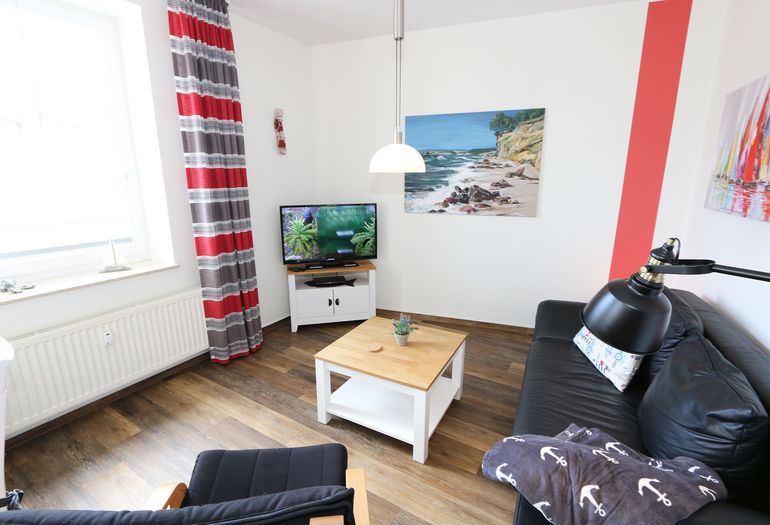 gemütlicher Wohnbereich mit Couch gemütlicher Wohnbereich mit Couch