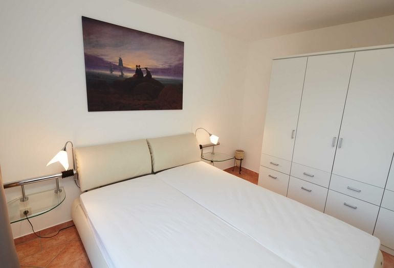 Ferienwohnung Strandstrasse 8/4 mit Balkon Ferienwohnung Strandstrasse 8/4 mit Balkon