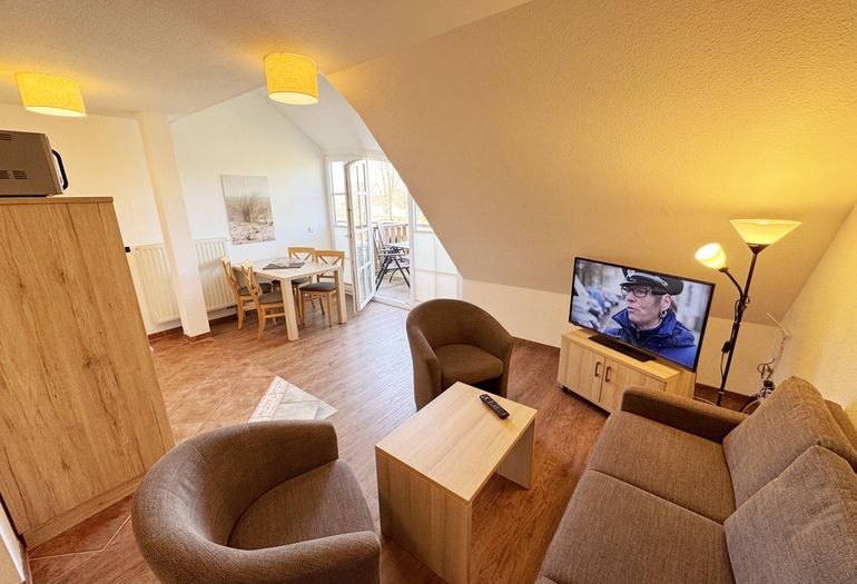 gemütlicher Wohnbereich mit Flachbild- TV