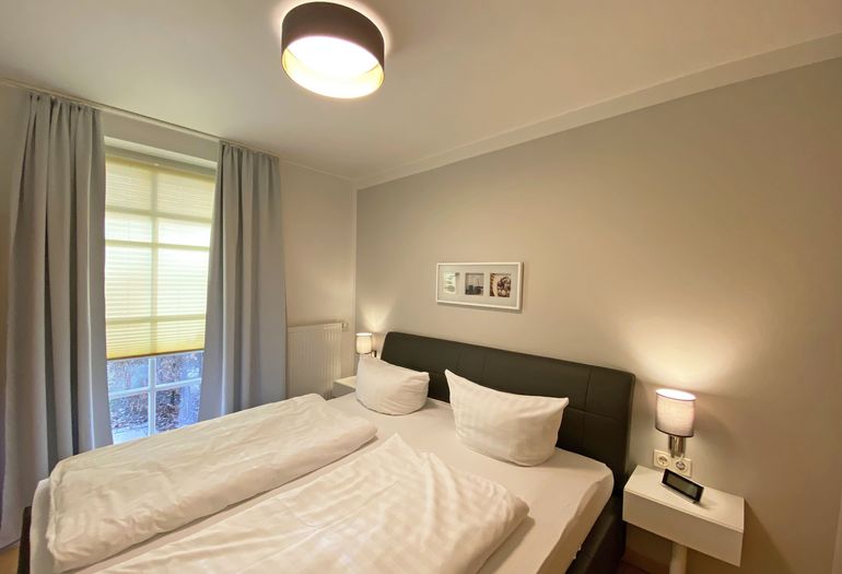 1. Schlafzimmer mit Doppelbett 1. Schlafzimmer mit Doppelbett