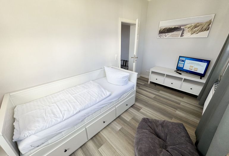 2. Schlafzimmer mit Kojenbett und Flachbild-TV 2. Schlafzimmer mit Kojenbett und Flachbild-TV