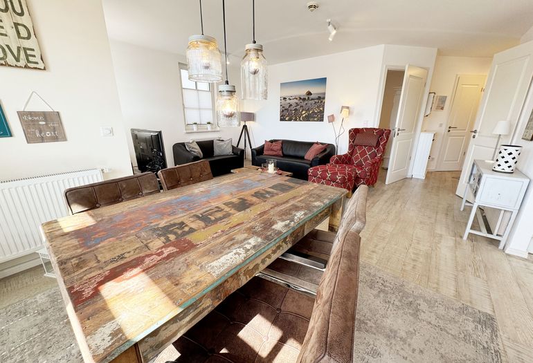 Haus Meeresblick A 2.12 BLU -Wohnzimmer mit Essbereich