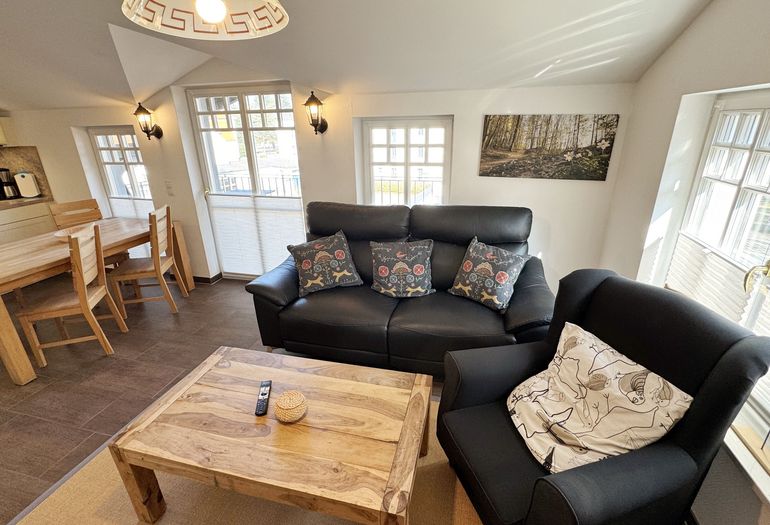 gemütlicher Wohnbereich mit Couch gemütlicher Wohnbereich mit Couch