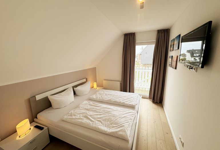 Ferienhaus Ilsebill - 2. Schlafzimmer mit Zugang zum Balkon