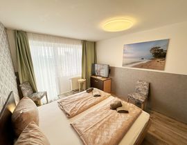 Haus Inselperle Whg. 02 mit Terrasse und Boddenblick