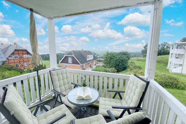 Haus Rügenscher Bodden Whg. 04 mit Balkon & Meerblick Haus Rügenscher Bodden Whg. 04 mit Balkon & Meerblick