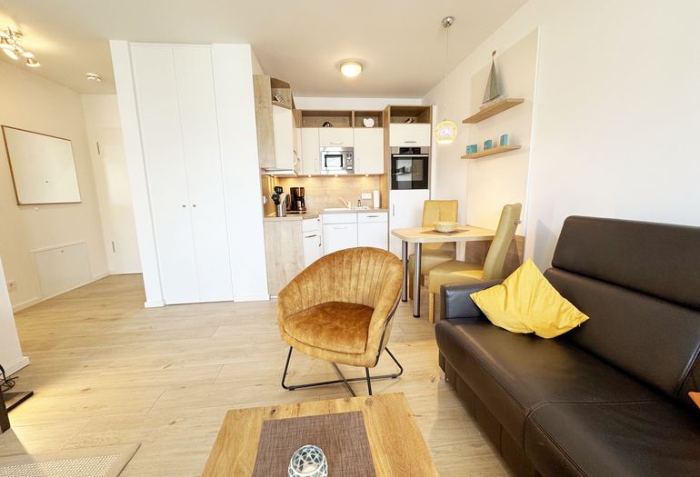 gemütlicher Wohnbereich mit Couch gemütlicher Wohnbereich mit Couch