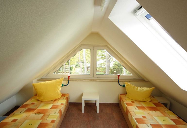 zweites Schlafzimmer mit getrennten Betten