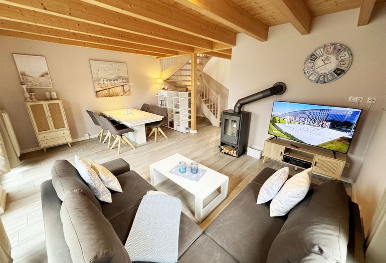 Ferienhaus Ilsebill - Relaxebereich mit TV und Kamin Ferienhaus Ilsebill - Relaxebereich mit TV und Kamin