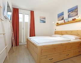 Villa Düne Whg. 14 mit Balkon/Meerblick & Sauna