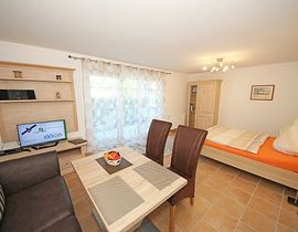 1-Raumappartement Kleine Perle mit Terrasse