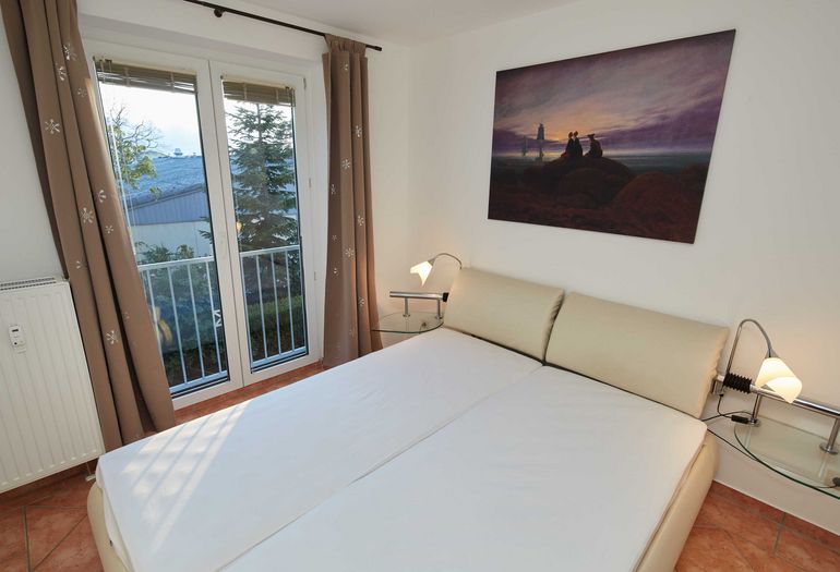 Ferienwohnung Strandstrasse 8/4 mit Balkon Ferienwohnung Strandstrasse 8/4 mit Balkon