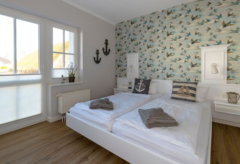 Schlafzimmer mit Doppelbett
