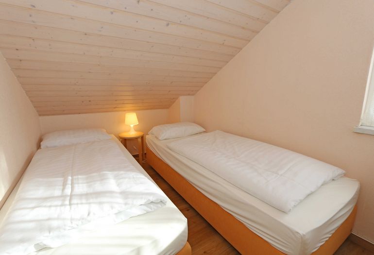 4. Schlafzimmer mit Einzelbetten