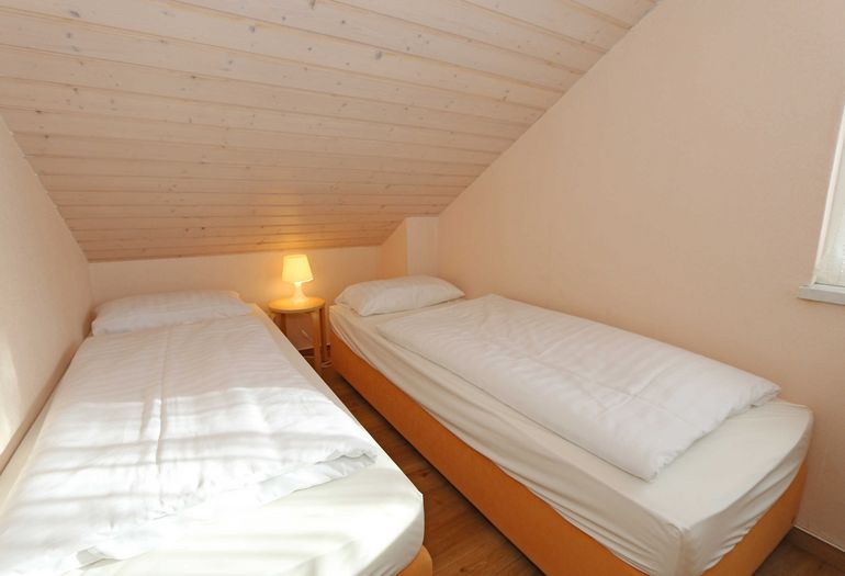4. Schlafzimmer mit Einzelbetten 4. Schlafzimmer mit Einzelbetten