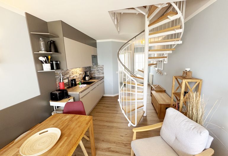 komfortabler Essbereich mit Sessel