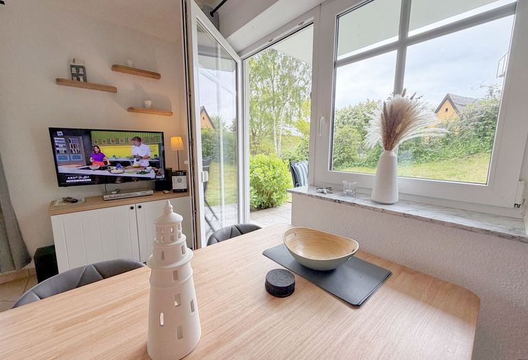 Dünenhaus Göhren Whg. 01 - Wohnzimmer mit Terrassenzugang Dünenhaus Göhren Whg. 01 - Wohnzimmer mit Terrassenzugang