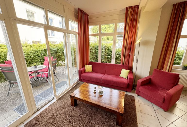 Couchecke mit Zugang zur Terrasse