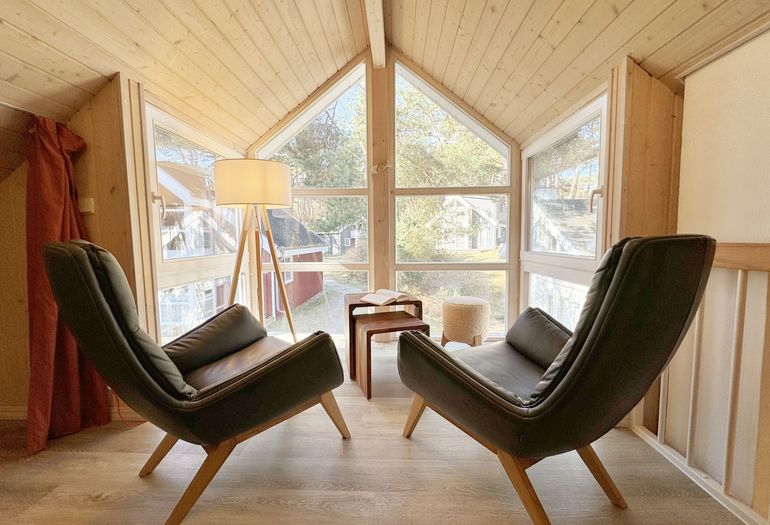 Ferienhaus Sprottenkiste - Galerie mit zwei Sessel Ferienhaus Sprottenkiste - Galerie mit zwei Sessel
