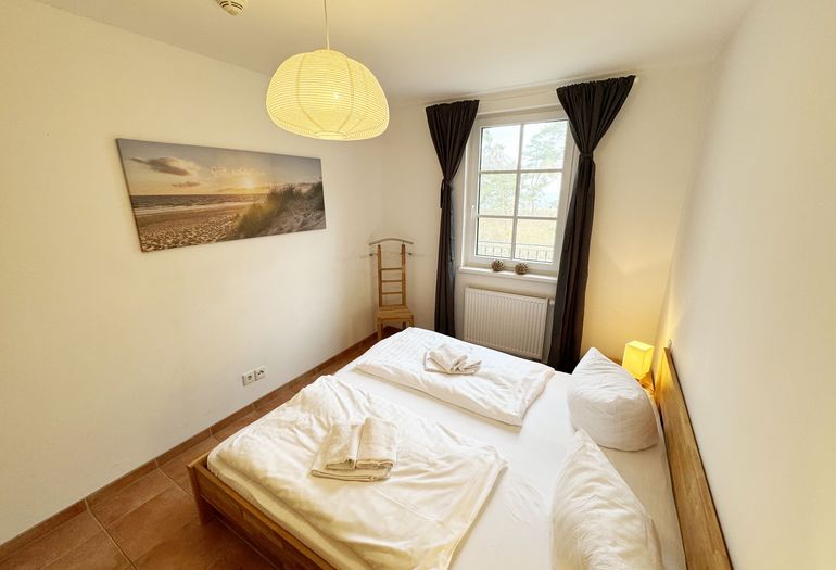 Schlafzimmer mit Doppelbett Schlafzimmer mit Doppelbett