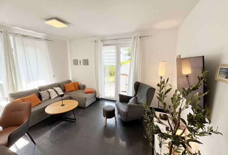 gemütlicher Wohnbereich mit Couch gemütlicher Wohnbereich mit Couch