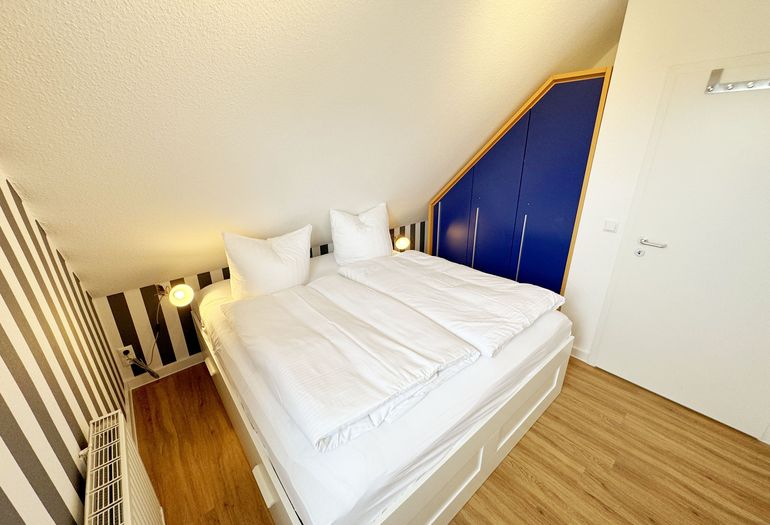 1. Schlafzimmer mit eingebauten Kleiderschrank 1. Schlafzimmer mit eingebauten Kleiderschrank
