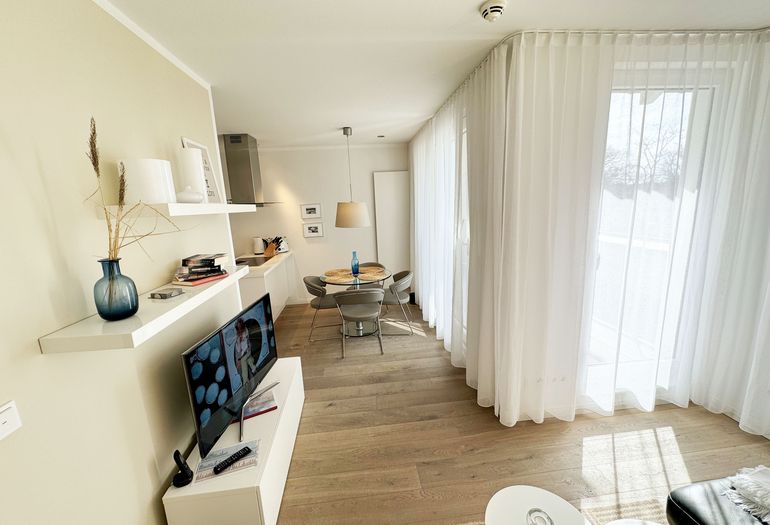 Haus Meeresblick A 4.03 Urlaubsglück - Blick in den Wohnbereich Haus Meeresblick A 4.03 Urlaubsglück - Blick in den Wohnbereich