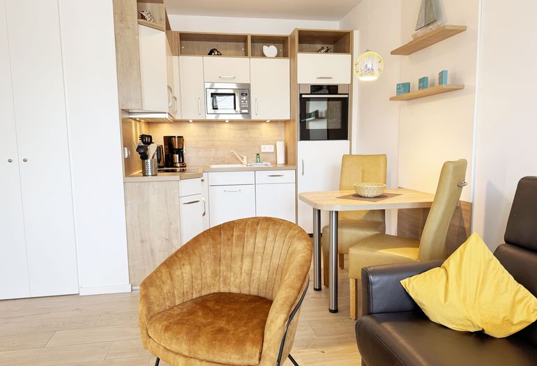 Blick vom Wohnbereich in den Küchenbereich Blick vom Wohnbereich in den Küchenbereich