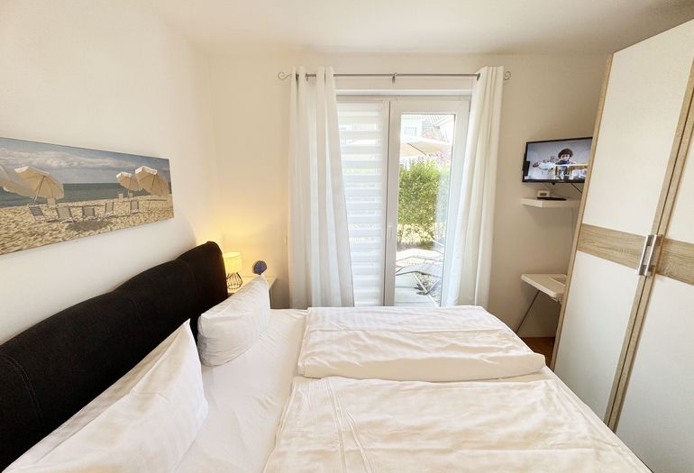 1.Schlafzimmer mit Doppelbett und Kleiderschrank 1.Schlafzimmer mit Doppelbett und Kleiderschrank