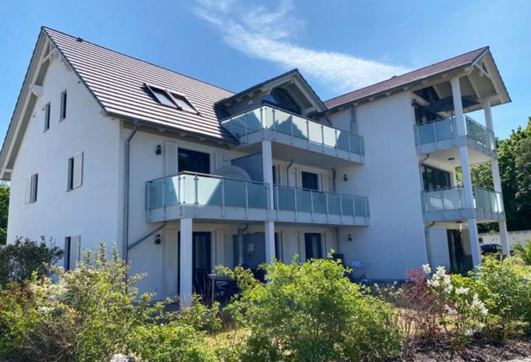Blick vom Parkplatz zum Haus Windrose Blick vom Parkplatz zum Haus Windrose