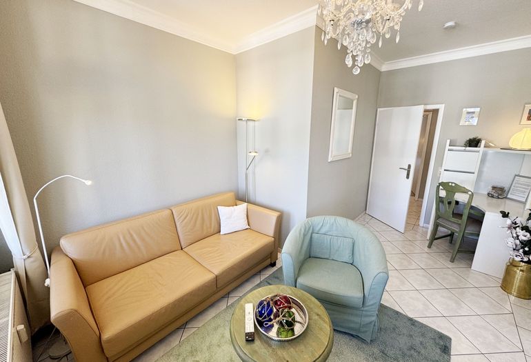 gemütlicher Wohnbereich mit Couch gemütlicher Wohnbereich mit Couch