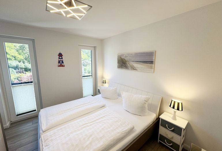 1. Schlafzimmer mit Doppelbett 1. Schlafzimmer mit Doppelbett