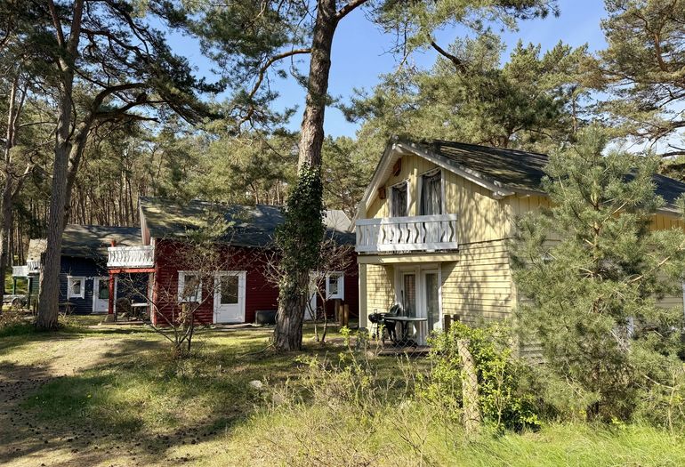 Strandhäuser im Dünenweg 54 mit Terrasse & Balkon Strandhäuser im Dünenweg 54 mit Terrasse & Balkon