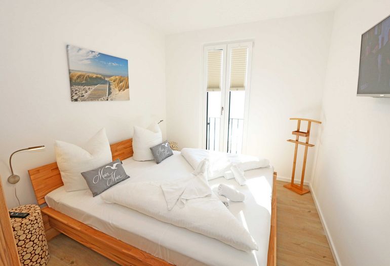 Schlafzimmer mit Doppelbett