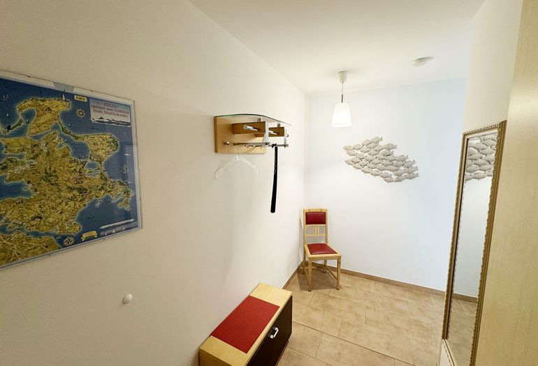 Flurbereich mit Sitzmöglichkeit Flurbereich mit Sitzmöglichkeit