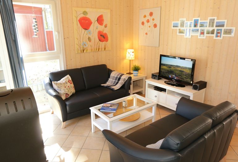 Ferienhaus Sandkörnchen - Couch- und TV-Bereich