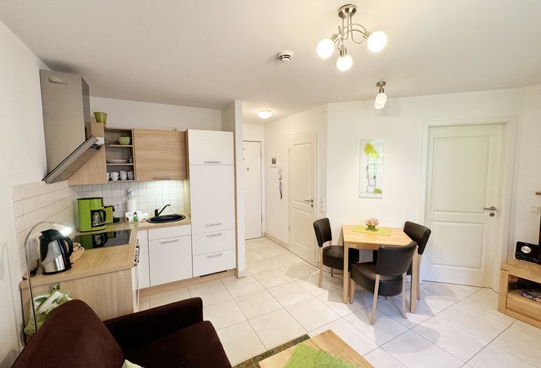 Küchenzeile angrenzend zum Wohnbereich Küchenzeile angrenzend zum Wohnbereich