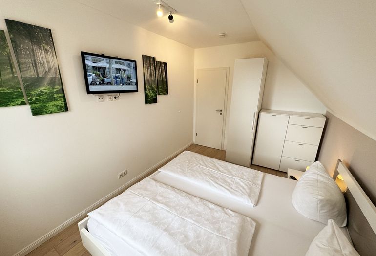Ferienhaus Ilsebill - 3. Schlafzimmer mit TV