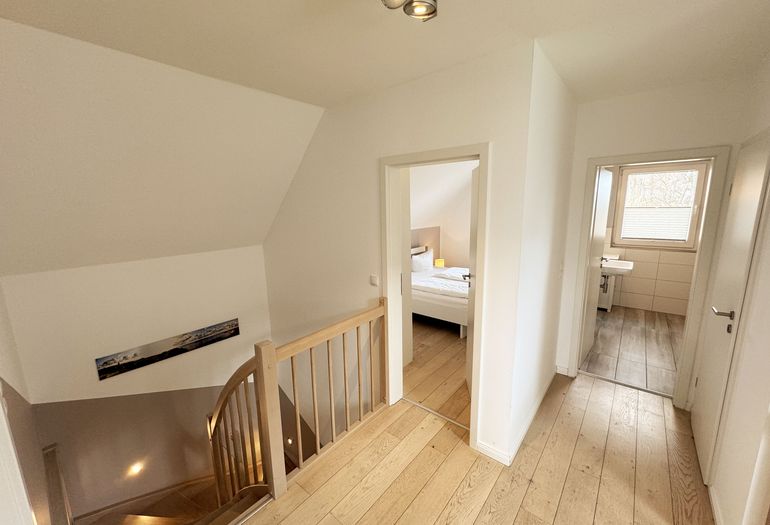 Ferienhaus Ilsebill - Flurbereich mit Blick auf das 3. Schlafzimmer und das 2. Bad