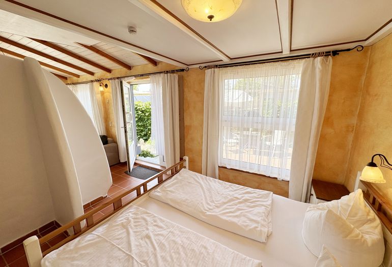 Ferienhaus Thea - offenes Schlafzimmer