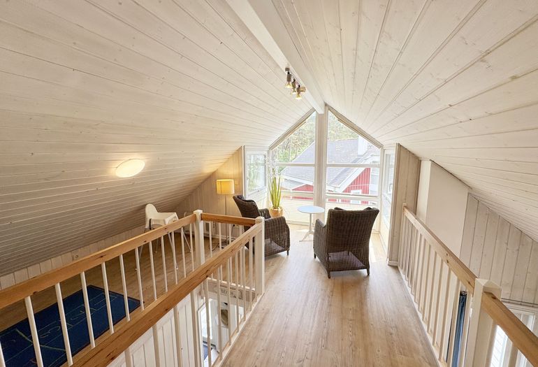 Ferienhaus Sandkörnchen - im oberen Bereich finde Sie eine lichtdurchflutete Galerie