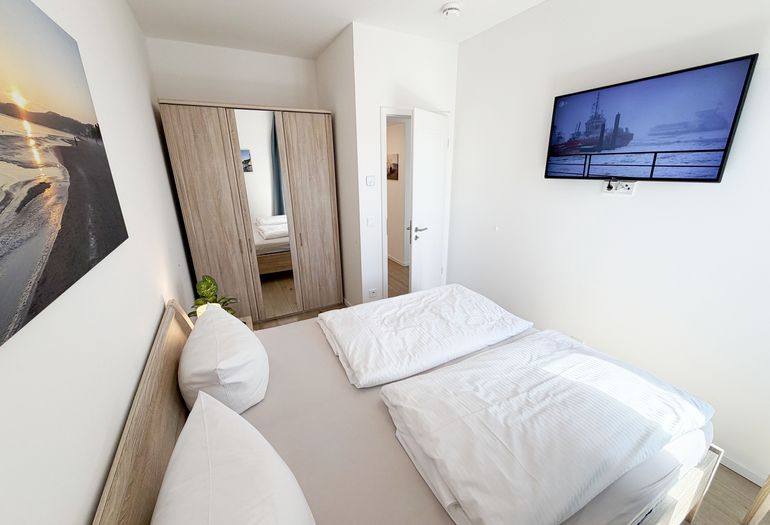 Villa Düne Whg. 19 Penthouse - Schlafzimmer Villa Düne Whg. 19 Penthouse - Schlafzimmer
