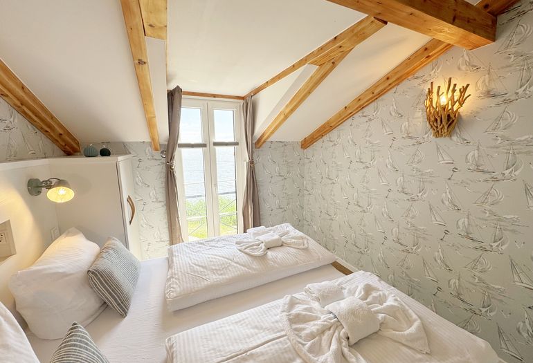 1. Schlafzimmer mit Seeblick 1. Schlafzimmer mit Seeblick